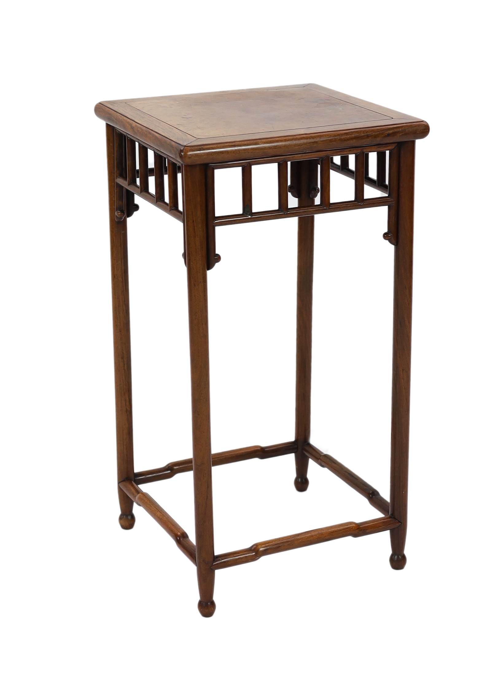 A Chinese huanghuali or hongmu incense stand, Qing dynasty, 77.5cm high, 41cm wide